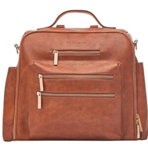 Honest Co cross country faux leather diaper bag and backpack